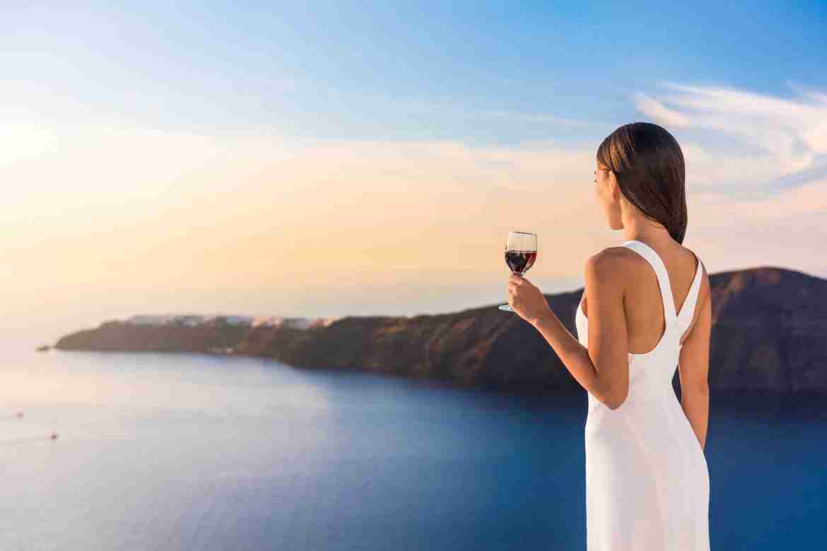 girl drinking wine wine of sicily landscape lcn firm blog