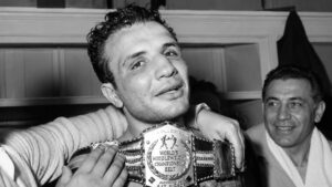 Jake LaMotta wearing the World Middleweight Championship belt during his boxing career